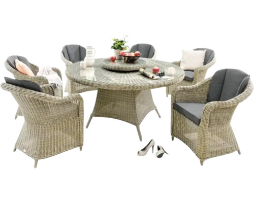 Gartensitzgruppe mit Rattanstühlen und rundem Glastisch für den Aussenbereich