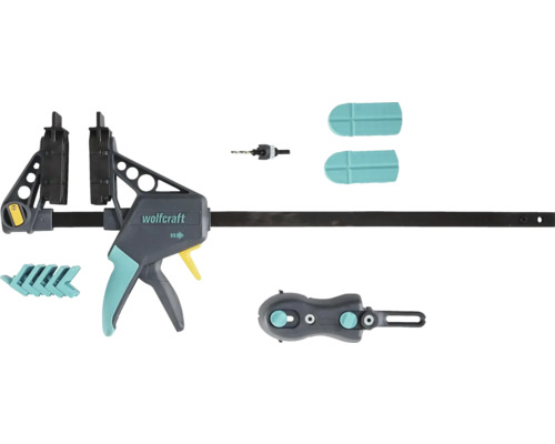 Serre-joint à une main Wolfcraft avec kit d accessoires comprenant un foret, des capuchons de protection et des adaptateurs.