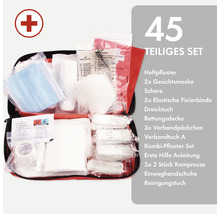 Kit de premiers secours de 45 pièces comprenant sparadraps, masques faciaux, ciseaux et bandages de fixation élastiques.