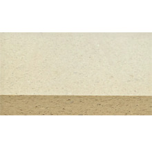 Gros plan d'un panneau de particules avec une surface beige clair