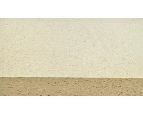 Gros plan d'un panneau de particules avec une surface beige clair