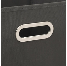 Gros plan d'un panier de rangement avec poignée