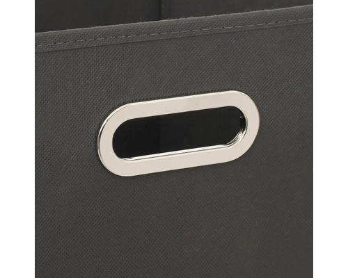 Gros plan d'un panier de rangement avec poignée