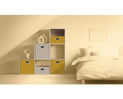 Chambre à coucher avec système d'étagères, boîtes de rangement et lit