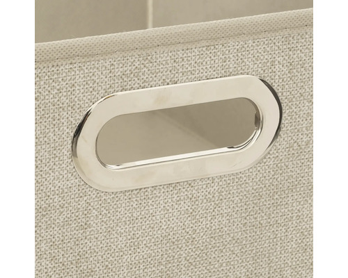 Gros plan d'un panier de rangement en tissu avec poignée