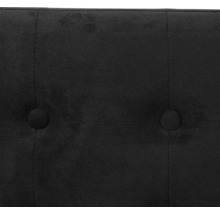 Gros plan d'un tissu touffeté noir avec des boutons