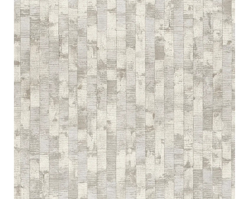 Papier peint intissé à motif vertical de rectangles irréguliers, aspect pierre avec texture légère.