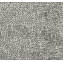 Gros plan d'un tissu d'ameublement gris à texture tissée