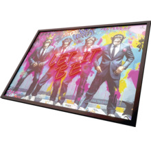 Gerahmtes Bild mit vier Affen in Anzügen und dem Schriftzug Let It Be