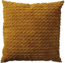 Coussin décoratif carré avec structure à picots en jaune moutarde.