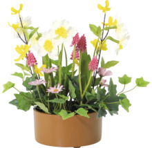 Blumenarrangement mit verschiedenen Kunstblumen in einem Topf