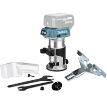 Défonceuse sans fil Makita 18 Volts avec accessoires tels que guide parallèle, raccord d aspiration et clés à fourche.