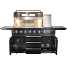Cuisine de grill avec boutons de commande, tiroirs et placards ouverts