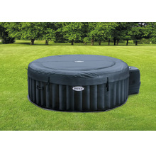 Jacuzzi rond gonflable avec couverture dans le jardin