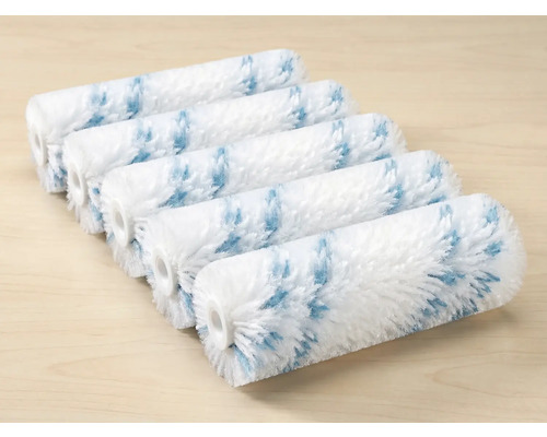 Cinq rouleaux de peinture blancs avec motif