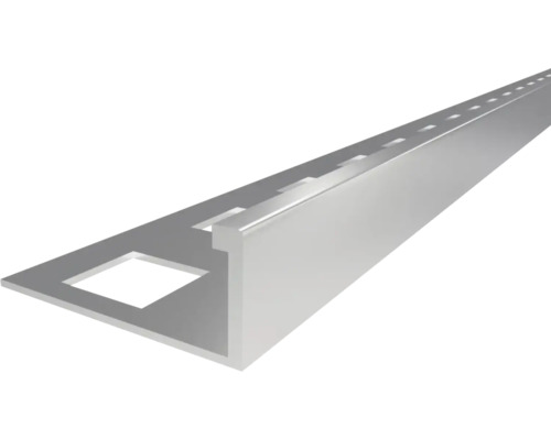 Profilé pour carrelage en aluminium, forme en L avec aile de fixation perforée.
