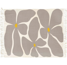 Tapis avec un grand motif floral abstrait et des franges