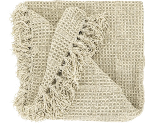 Plaid beige avec tissage gaufré et franges.