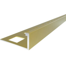 Profilé pour carrelage en L en aluminium d'aspect doré avec perforations carrées.