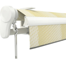 Markise mit manuellem Kurbelantrieb, weißem Gehäuse und gelb gemustertem Stoff.