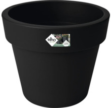 Pot de fleurs rond Elho noir en plastique recyclé avec un large bord.