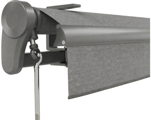 Detailansicht einer Markise mit grauem Stoff, Gehäuse und Kurbelöse.