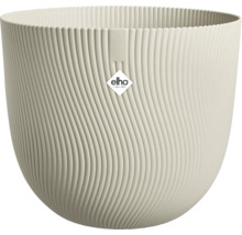 Pot de fleurs rond Elho en plastique blanc crème avec structure ondulée verticale et logo Elho.