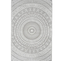 Tapis d'extérieur avec motif mandala circulaire et structure tissée.