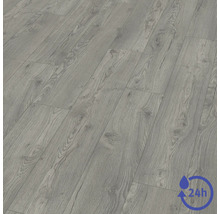 Revêtement de sol stratifié aspect chêne gris avec veinage du bois et résistance à l'eau de 24 heures.