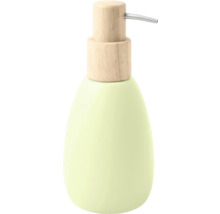 Distributeur de savon avec corps vert menthe et tête de pompe aspect bois.