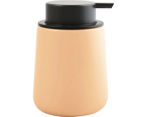 Distributeur de savon en céramique de couleur pêche avec pompe noire pour la salle de bain.