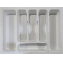 Range-couverts blanc en plastique avec six compartiments pour tiroir.