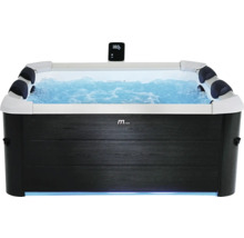 Whirlpool MSpa avec habillage aspect bois, eau bouillonnante, appuie-têtes et écran numérique affichant 38 degrés.