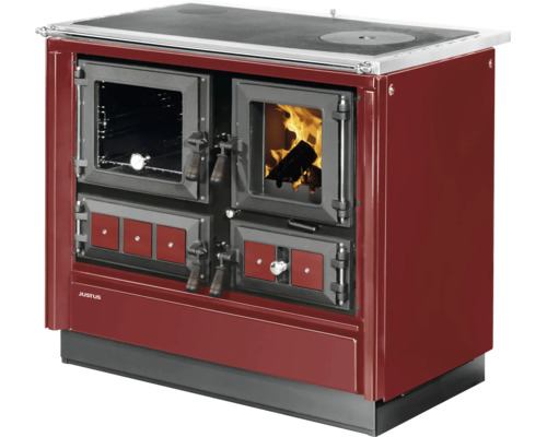 Cuisinière à bois rouge Justus avec four, vitre avec feu et plaque de cuisson.