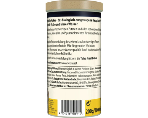 Verso de la boîte de nourriture pour poissons TetraMin Flakes avec ingrédients, constituants analytiques et conseils d'alimentation.