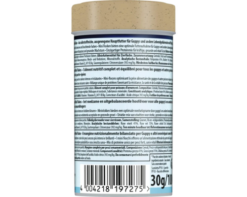 Dos d'un emballage de nourriture pour poissons Mini Flakes pour guppys avec ingrédients, instructions d'alimentation et code-barres, 30 grammes.