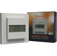Thermostat à batterie Heatit Z-Temp3 Z-Wave blanc avec écran LCD et boutons de commande à côté de son emballage.
