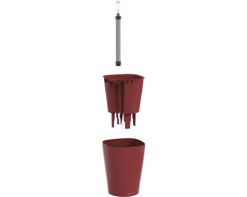 Système d'arrosage Lechuza en trois parties avec indicateur de niveau d'eau, bac d'arrosage à mèche et un pot de fleurs rouge.