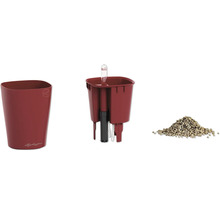 Rotes Lechuza Pflanzgefäß-Set mit Übertopf, Pflanzeinsatz, Bewässerungssystem mit Wasserstandsanzeiger und Docht sowie Pflanzsubstrat.