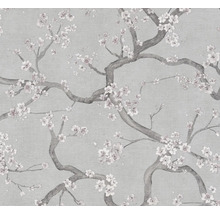 Papier peint intissé texturé avec un motif de branches fleuries.