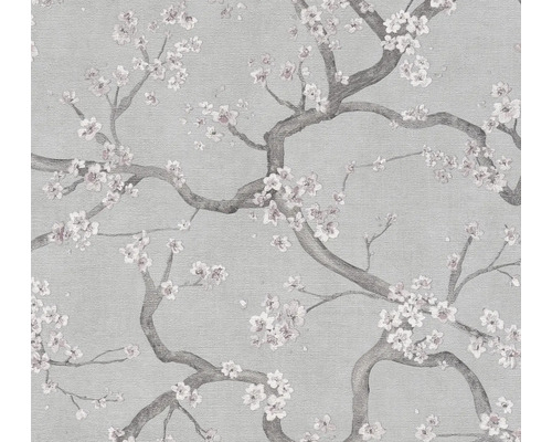 Papier peint intissé texturé avec un motif de branches fleuries.