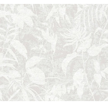 Papier peint intissé avec motif de feuilles florales et surface structurée en aspect pierre claire.