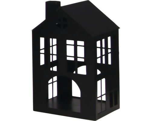Maison décorative en métal noir avec découpes de fenêtres et cheminée.