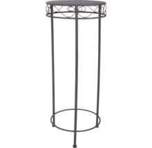 Colonne porte-plantes décorative en métal avec plateau rond et ornements sur le bord.
