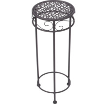 Runder Blumenhocker aus Metall mit perforierter Abstellfläche und dekorativen Ornamenten.