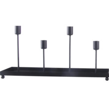 Bougeoir noir en métal avec quatre supports de différentes hauteurs sur un plateau.