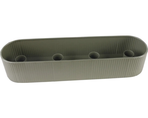 Bougeoir ovale gris avec surface nervurée et quatre inserts pour bougies.