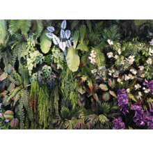 Mur végétal artificiel composé de fougères, de feuilles de monstera et d'orchidées pour décoration murale.