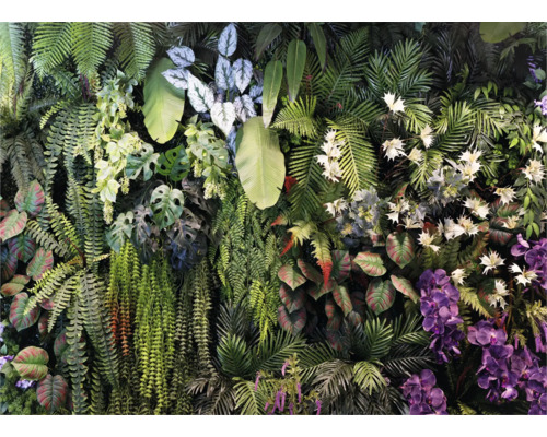 Mur végétal artificiel composé de fougères, de feuilles de monstera et d'orchidées pour décoration murale.