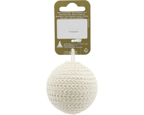 Boule de Noël tricotée en textile sur un support en carton avec GEROMA Logo et avertissement de sécurité.